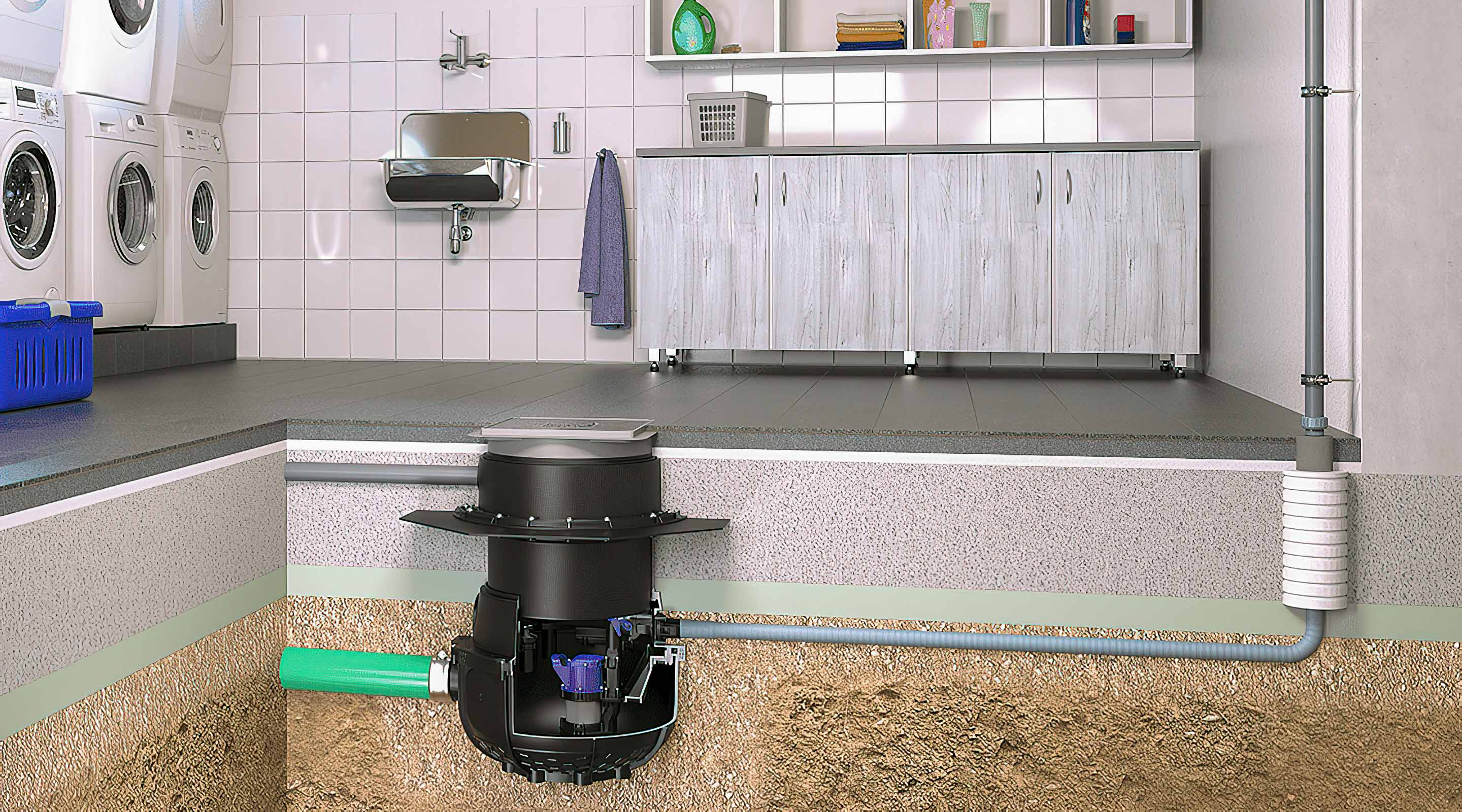 Die Abbildung zeigt einen Waschraum, in dessen Fußboden eine Hebeanlage Aqualift in einem befliesbaren Schachtmodul eingebaut ist